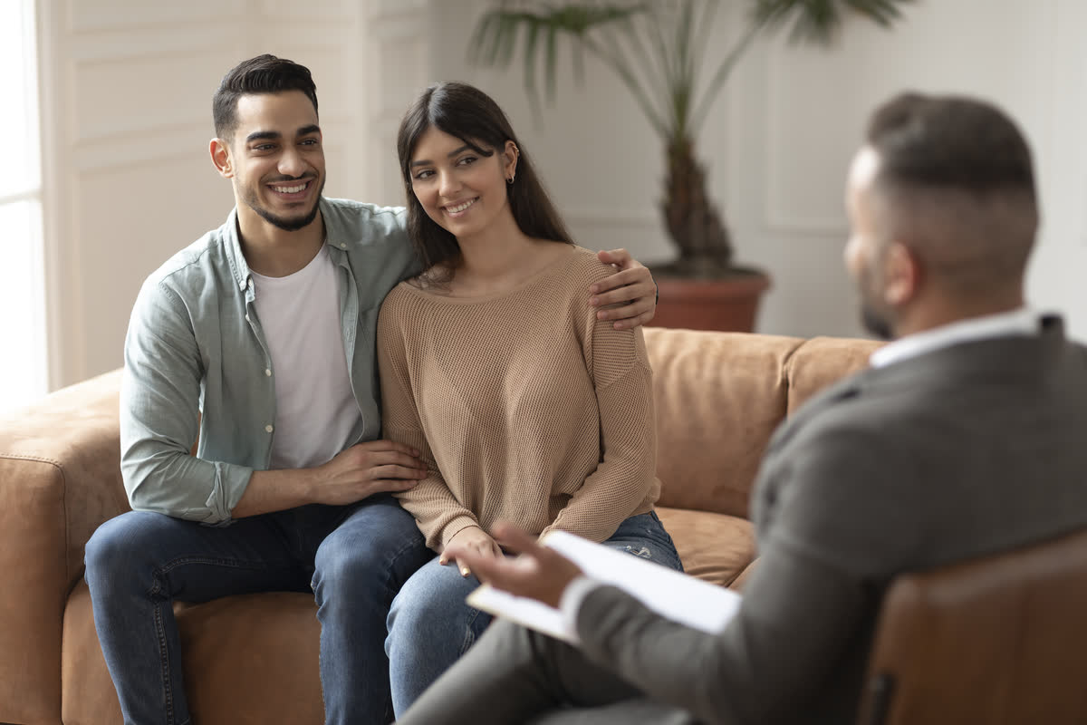 A couple reviewing coverage options with an advisor